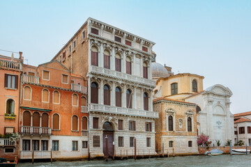 Fototapeta na wymiar View of architecture of Venice from Grand Canal. Beautiful colorful houses on narrow water streets, Venice, Italy. High quality photo
