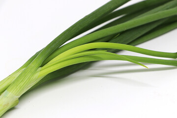 spring onion isolated on white background, closeup green onions..