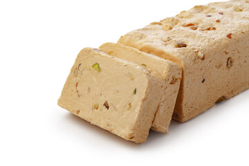 Turkish dessert halva slices isolated on white