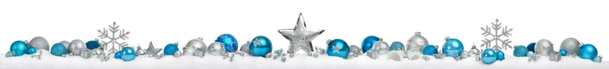 Christmas border or banner with stars and baubles arranged in a row on snow, silver and blue, extra...