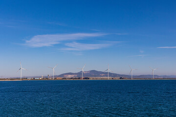 Fototapeta na wymiar View over the pier of the port of Piombino af the sea