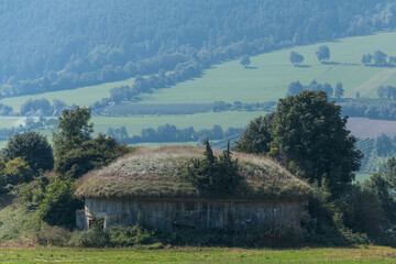 massive air raid shelter on green field