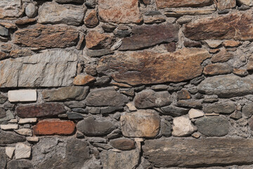 Facade of natural stones masonry