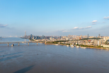 Wuhan skyline and Yangtze river with supertall skyscraper under construction in Wuhan Hubei China.	