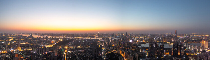 Wuhan skyline and Yangtze river with supertall skyscraper under construction in Wuhan Hubei China.	