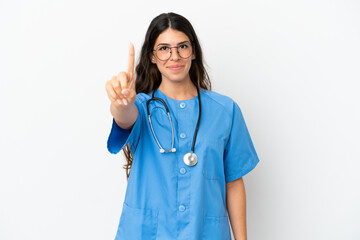 Young surgeon doctor caucasian woman isolated on white background showing and lifting a finger