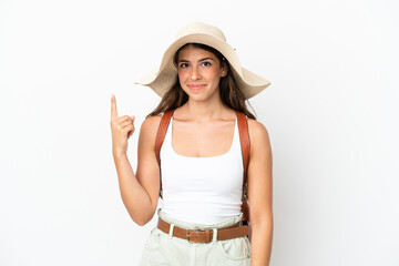 Obraz na płótnie Canvas Young caucasian woman wearing a Pamela in summer holidays isolated on white background pointing with the index finger a great idea