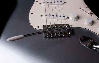 Fototapeta na wymiar Part of electric guitar isolated on white background