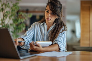 Adult woman, looking at her bank balance