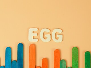 Terengganu, Malaysia-October 27,2021 :Wooden Egg Word With Blue Background