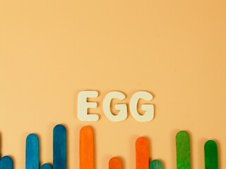 Terengganu, Malaysia-October 27,2021 :Wooden Egg Word With Blue Background