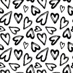 Black brush stroke hearts on white background seamless pattern. Black paint heart repeat print. Valentine's day ornament for textile, fabric, wallpaper, wrapping paper, design and decoration.