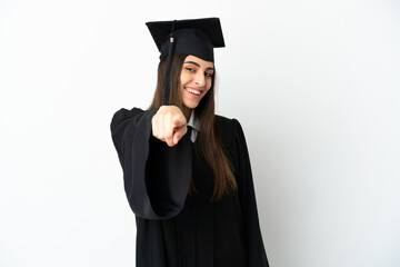 Young university graduate isolated on white background pointing front with happy expression