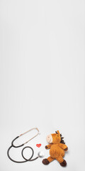 A red heart and a stethoscope or phonendoscope with a plush toy on a white background, a vertical medical banner: pediatric cardiology, blood donor for children. Banner of Health and Medicine