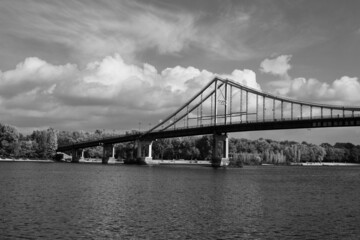 Black and white photo: my native Kyiv. Pedestrian bridge over the Dnieper river.