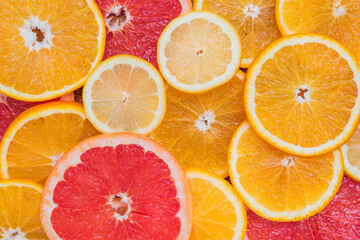 Vitamin C. Citrus fruit background oranges lemons and grapefruit as a symbol of a healthy diet and strengthening the immune system with natural vitamins.