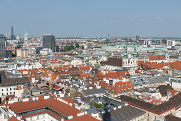 Fototapeta na wymiar Austria Vienna city view from the bell tower of St. Stephen's Cathedral on a cloudy spring day 