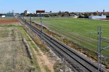 Fototapeta premium Train tracks through a small town called Gomecello in Salamanca