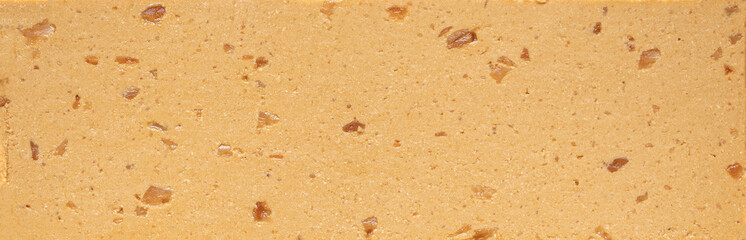 Nougat Turron Almond nuts as a  Background with texture. Tourron Wallpaper. Top view.