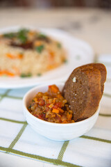 black bread with vegetable stew on the table