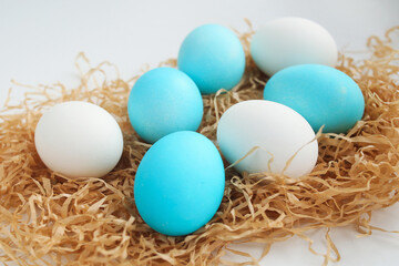 Fototapeta na wymiar Blue and white Easter eggs. Painted easter eggs