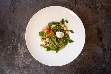 pasta with red caviar and salmon top view