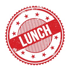 LUNCH text written on red grungy round stamp.