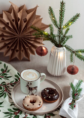 Composition with Cup of Cappuccino and Donuts Morning Lights Christmas Concept