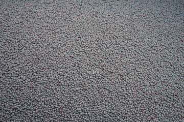 Iron-ore pellets inside open-top train wagon