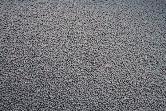 Iron-ore pellets inside open-top train wagon