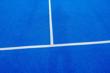 Fototapeta na wymiar Serving lines of a blue paddle tennis court
