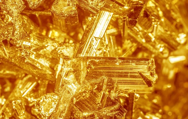 Golden crystal mineral stone. Gems. Mineral crystals in the natural environment. Texture of...