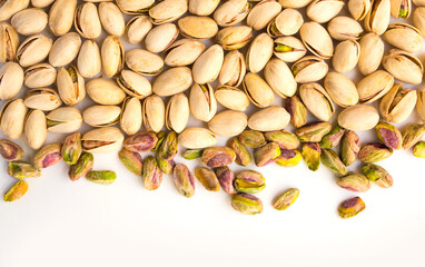 roasted pistachio nuts on a white plate and a place for inscription