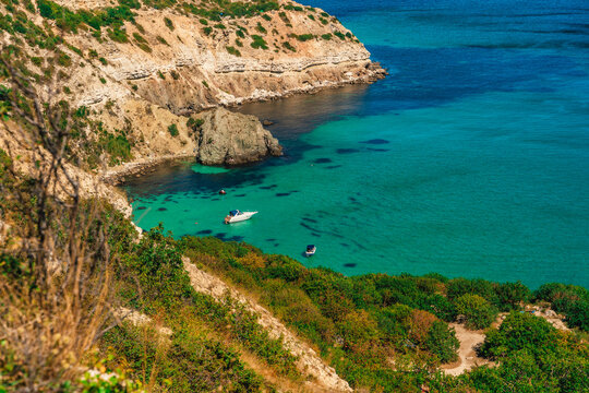 Panoramic sea view on Cape Fiolent in Crimea. A famous place for tourists on the Black Sea coast with azure water © KseniaJoyg