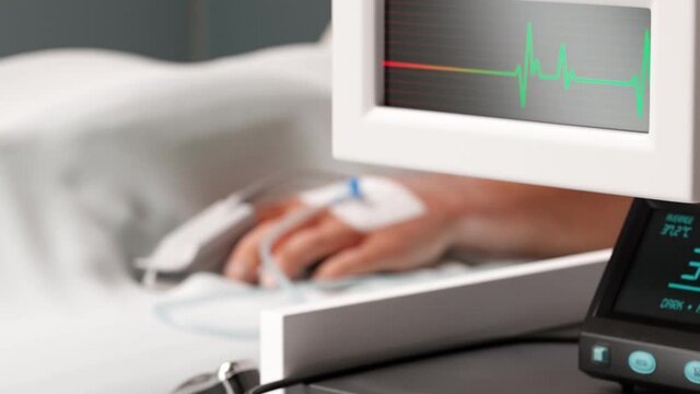 A hospital patient on IV is dying. The pulse is fading. Close up on man's hand.