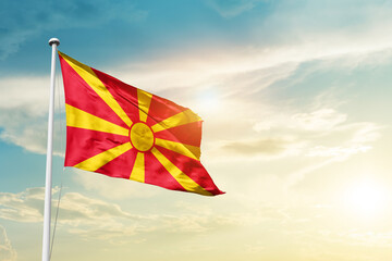 North Macedonia national flag cloth fabric waving on the sky - Image