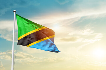 Tanzania national flag cloth fabric waving on the sky - Image - obrazy, fototapety, plakaty