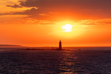 lighthouse at sunset in Portland, ME