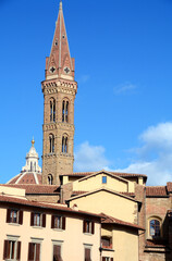 Obraz premium The beautiful San Firenze square in Florence with the palaces of the Renaissance, the bell tower of the Florentine Badia. 