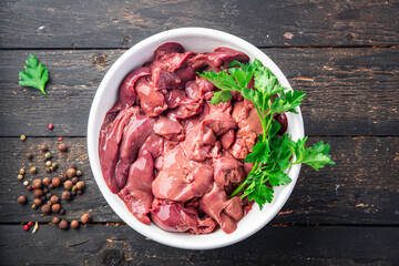 chicken liver raw piece portion ready to eat meal snack on the table copy space food background...