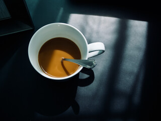 Coffee in the Morning Shadow and Sunshine