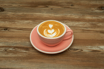 Barista coffee with little plant drawing with cream
