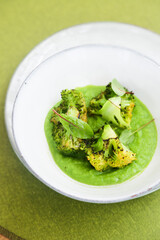 Roasted broccoli with pea puree