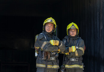 Portrait of a fireman wearing firefighter turnouts and helmet,Fireman in emergency situation.