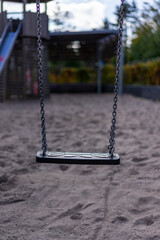 empty swing on playground