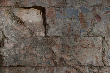 Fragment of the old wall. A wall of large stone blocks. Background, texture of stone.