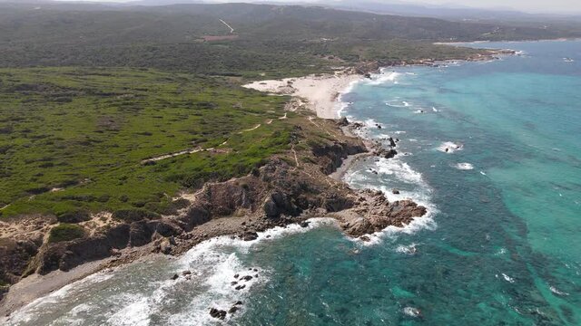 Stunning drone view of a coastline, Rena Majore Beach, Sardinia, taken on summer day 2021 in Italy Santa Teresa Gallura.