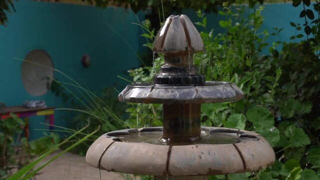 Stone statue of a young girl among the trees - CIRCA 2020 - The beautiful and imaginative Anima Garden in Marrakesh, Morocco
