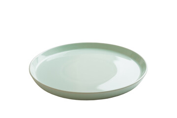 Blue ceramic round plate isolated over white background. perspective view