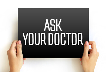 ASK YOUR DOCTOR text on card, medical concept background
